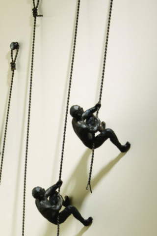 Wall-Mounted Climbing Man